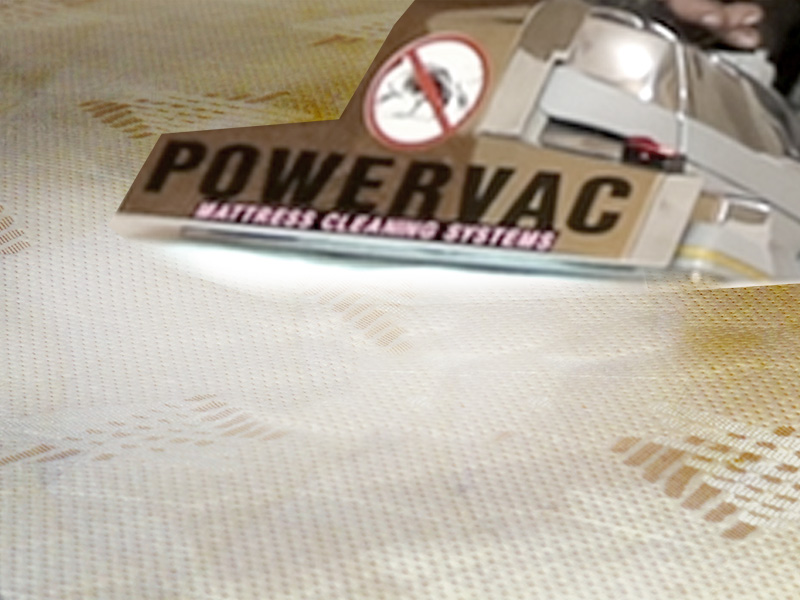 A Power Vac branded mattress cleaning systems in action